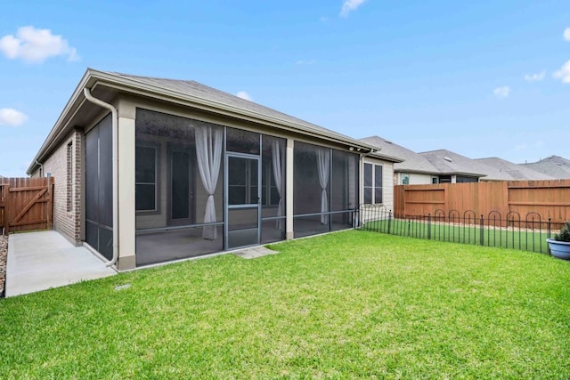 15335 Oakheath Colony Ln, Houston, TX 77044 - rear view of property featuring a sunroom