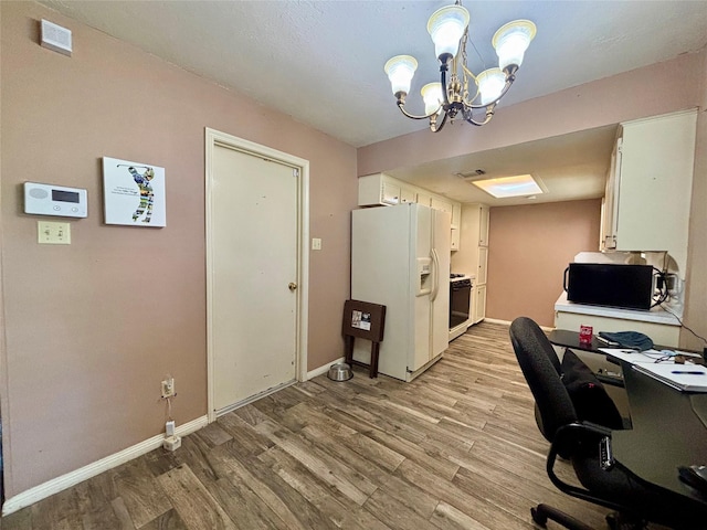 13642 Greenridge Dr, Sugar Land, TX 77498 - office with light wood-style floors, baseboards, and a chandelier