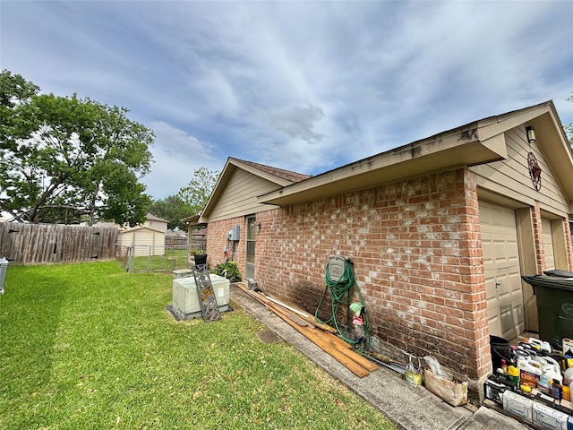 13642 Greenridge Dr, Sugar Land, TX 77498 - view of home's exterior featuring brick siding and a garage