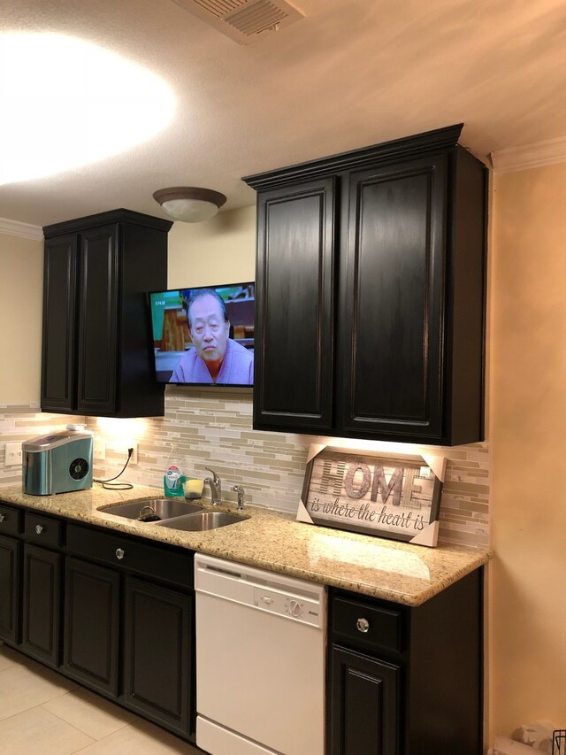 11905 Algonquin Dr Unit 10, Houston, TX 77089 - bar with white dishwasher, tasteful backsplash, a sink, ornamental molding, and light tile patterned flooring