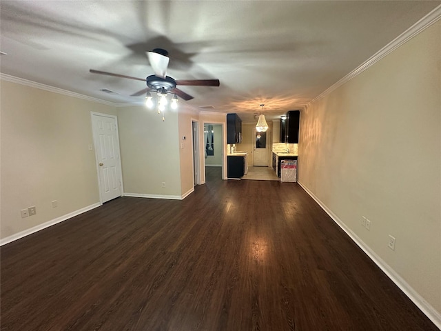 11905 Algonquin Dr Unit 10, Houston, TX 77089 - unfurnished living room with a ceiling fan, dark wood finished floors, crown molding, and baseboards