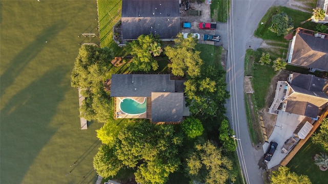 aerial view of property's location with a pool