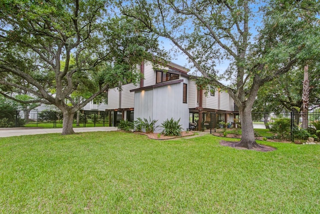 view of home's exterior featuring concrete driveway