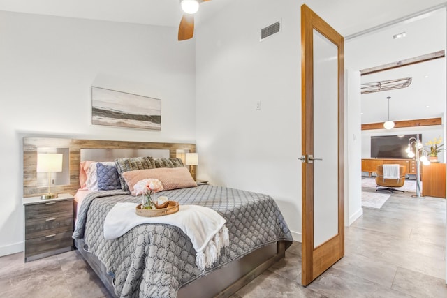bedroom featuring baseboards and ceiling fan