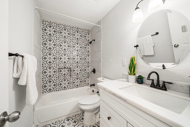 bathroom featuring tub / shower combination, toilet, vanity, and tile patterned floors