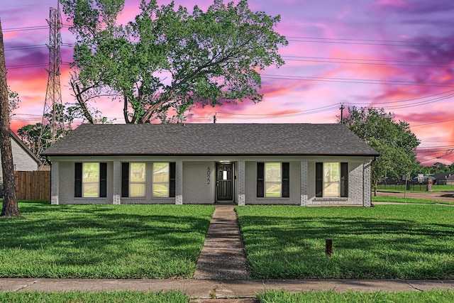 view of front of property featuring brick siding