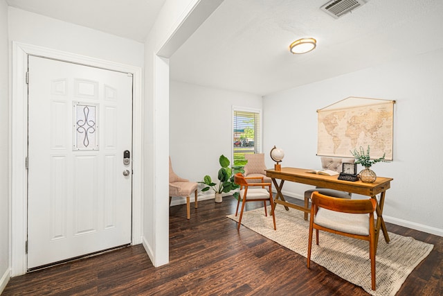 office area with baseboards and dark wood finished floors