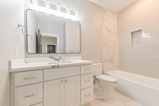 full bath with toilet, marble finish floors, vanity, and shower / tub combination