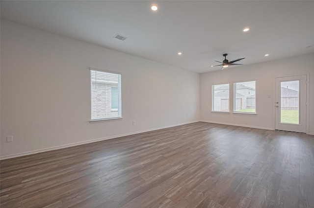 5422 Evergreen Heights Ln, Spring, TX 77373 - unfurnished room featuring plenty of natural light, a ceiling fan, dark wood-style flooring, and recessed lighting
