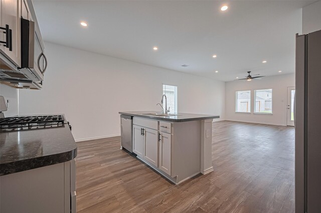 5422 Evergreen Heights Ln, Spring, TX 77373 - kitchen with a sink, a ceiling fan, appliances with stainless steel finishes, plenty of natural light, and recessed lighting