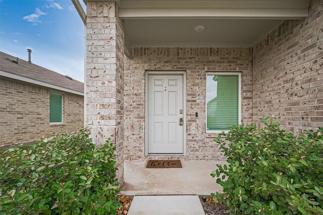 5422 Evergreen Heights Ln, Spring, TX 77373 - view of exterior entry featuring brick siding