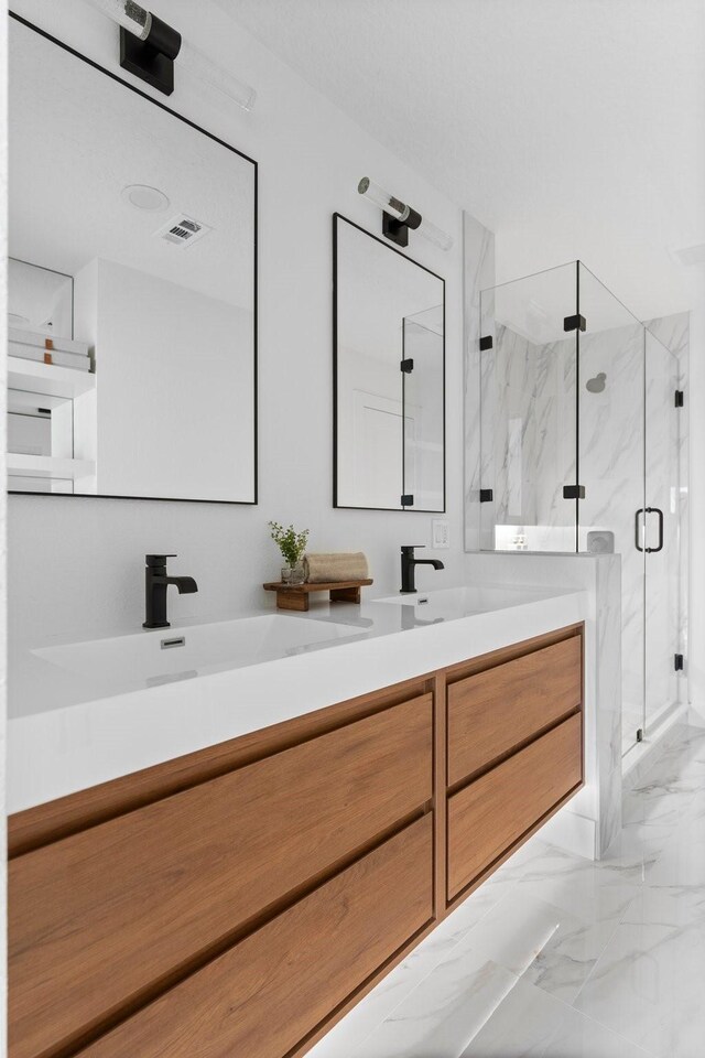 2003 Longstraw Pl, The Woodlands, TX 77380 - full bathroom featuring marble finish floors, double vanity, and a marble finish shower