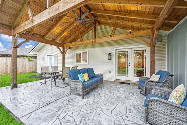 view of patio / terrace with french doors, fence, outdoor lounge area, and outdoor dining area