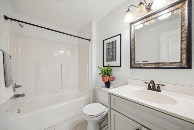 bathroom with vanity, toilet, washtub / shower combination, tile patterned flooring, and a chandelier