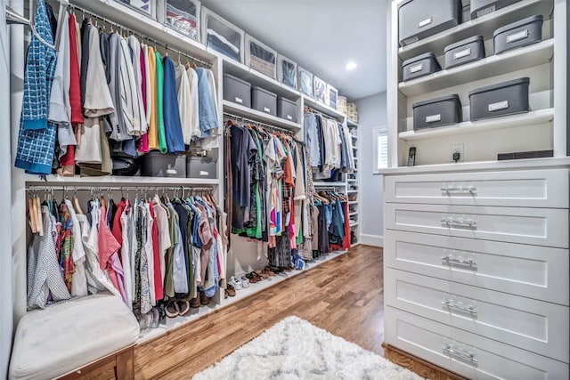 7119 Janet St, Houston, TX 77055 - walk in closet with wood finished floors