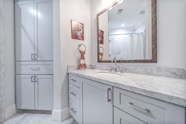 7119 Janet St, Houston, TX 77055 - bathroom with vanity, baseboards, crown molding, a shower with shower curtain, and marble finish flooring