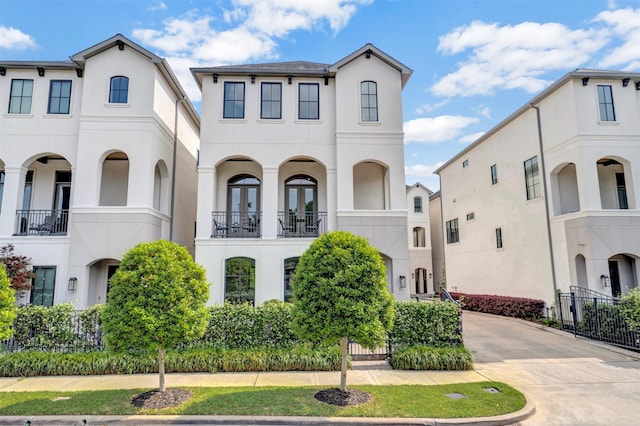 7119 Janet St, Houston, TX 77055 - view of front of property with stucco siding and concrete driveway
