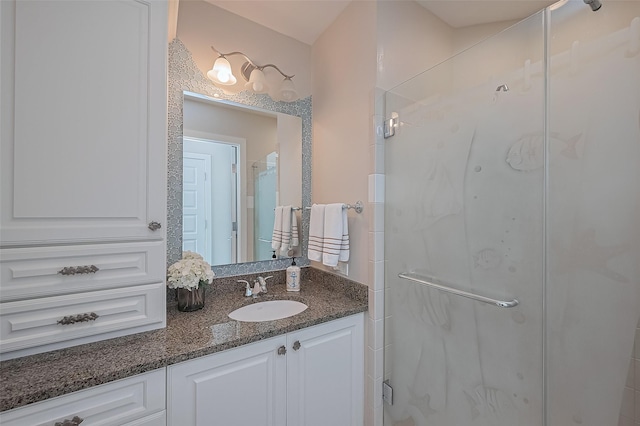 801 E Beach Dr Unit Tw2008, Galveston, TX 77550 - bathroom featuring a stall shower and vanity