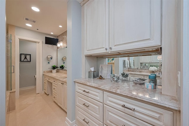 801 E Beach Dr Unit Tw2008, Galveston, TX 77550 - bar area with recessed lighting and light tile patterned floors
