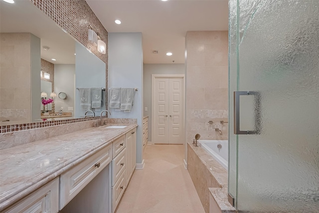 801 E Beach Dr Unit Tw2008, Galveston, TX 77550 - full bath featuring a bath, vanity, recessed lighting, tile patterned flooring, and baseboards