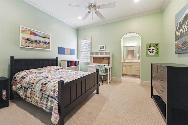 bedroom with carpet, crown molding, baseboards, recessed lighting, and connected bathroom