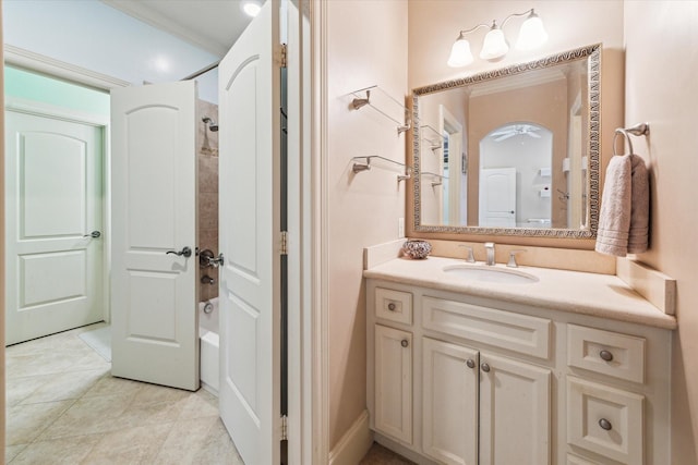 bathroom with vanity, shower / bath combination, and tile patterned flooring