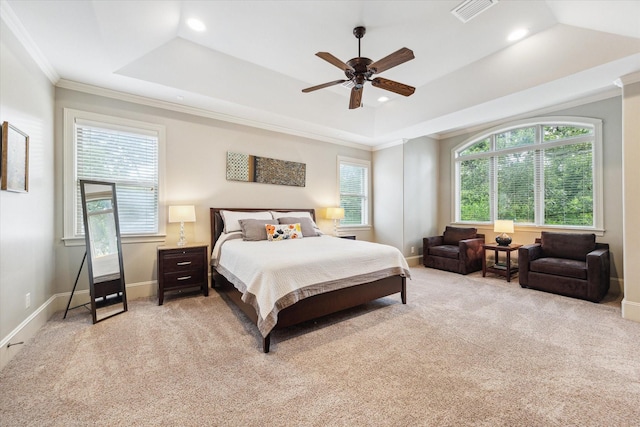 bedroom with ornamental molding, light carpet, a raised ceiling, recessed lighting, and baseboards