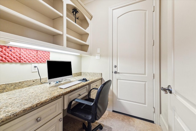 home office featuring built in study area