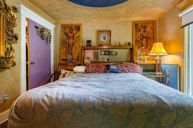 bedroom with crown molding