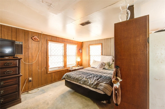1577 Channel Dr, Brazoria, TX 77422 - carpeted bedroom with wood walls