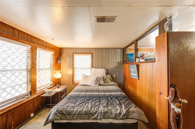 1577 Channel Dr, Brazoria, TX 77422 - bedroom featuring carpet flooring and wood walls