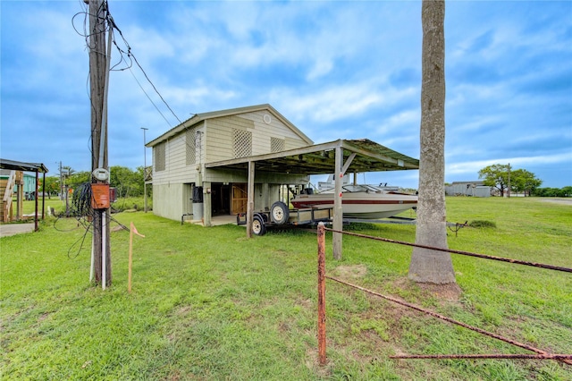 1577 Channel Dr, Brazoria, TX 77422 - view of outbuilding featuring a carport