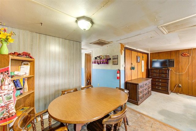 1577 Channel Dr, Brazoria, TX 77422 - dining area featuring wood walls