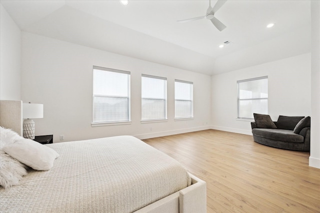 bedroom with light wood-style floors, vaulted ceiling, ceiling fan, baseboards, and recessed lighting