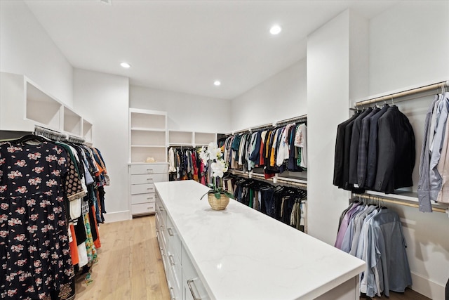 spacious closet with light wood-style flooring