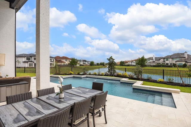 13611 Milan Meadow Ct, Houston, TX 77077 - view of swimming pool with a fenced backyard, a residential view, a patio, and a water view