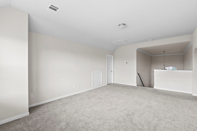10015 Chase Ct, Baytown, TX 77521 - empty room featuring carpet, lofted ceiling, and baseboards
