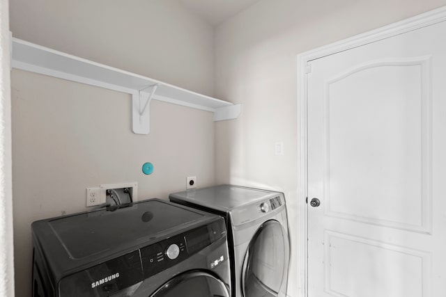 10015 Chase Ct, Baytown, TX 77521 - laundry area with separate washer and dryer