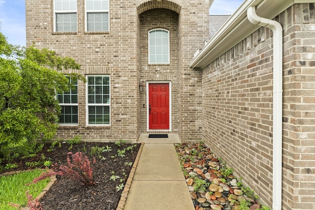 10015 Chase Ct, Baytown, TX 77521 - doorway to property featuring brick siding