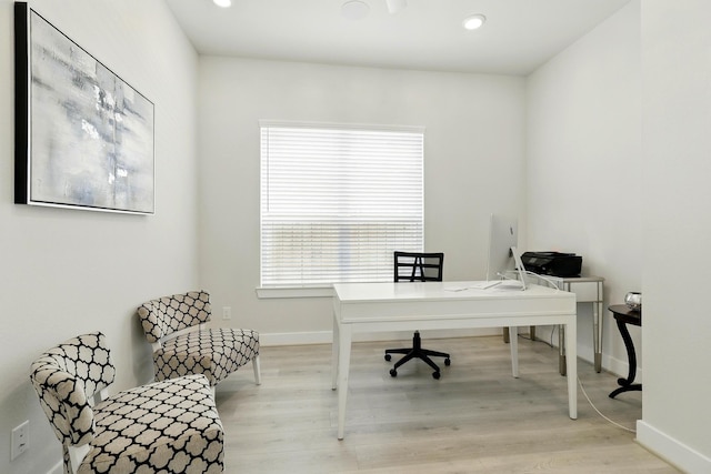 home office with plenty of natural light, baseboards, light wood-type flooring, and recessed lighting