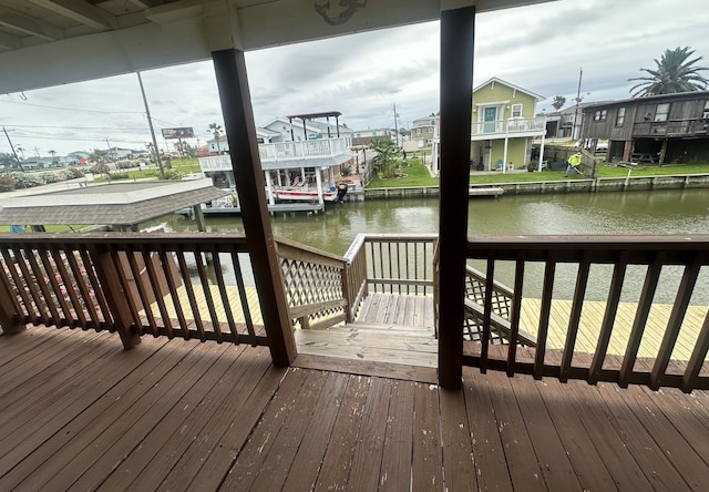 11 Highland Dr, Hitchcock, TX 77563 - wooden terrace featuring a water view