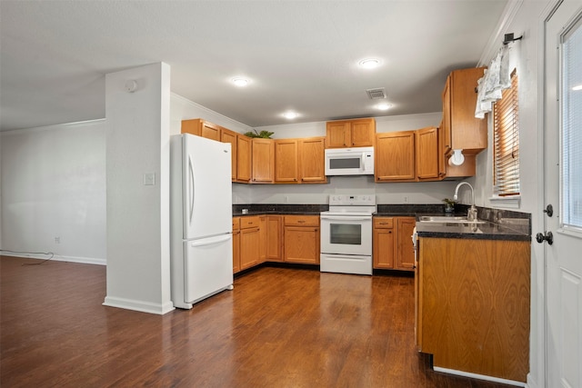 11 Highland Dr, Hitchcock, TX 77563 - kitchen with white appliances, a sink, ornamental molding, dark wood finished floors, and baseboards