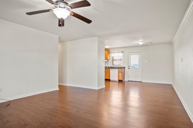 11 Highland Dr, Hitchcock, TX 77563 - unfurnished living room featuring crown molding, wood finished floors, ceiling fan, baseboards, and a sink