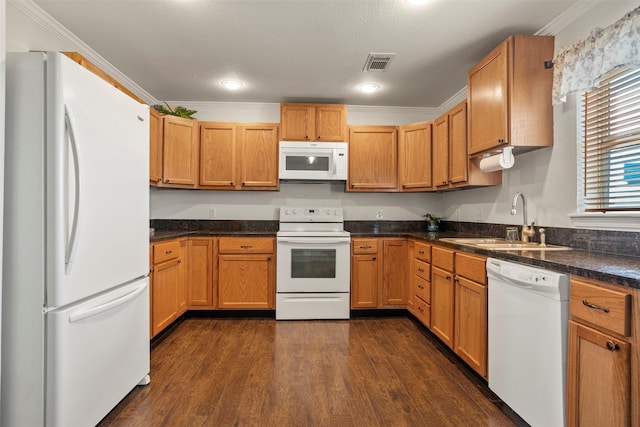 11 Highland Dr, Hitchcock, TX 77563 - kitchen featuring white appliances, a sink, dark wood-style floors, crown molding, and dark countertops