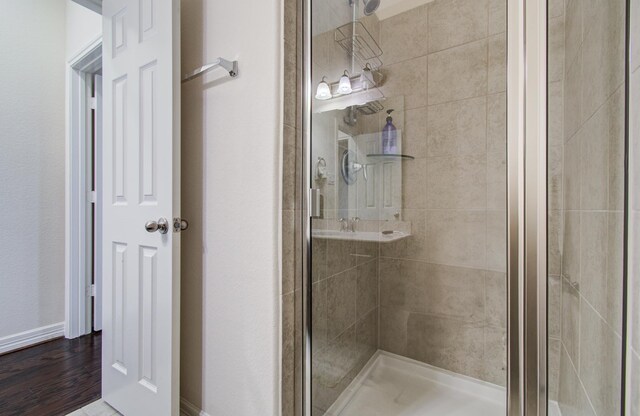 full bath featuring a stall shower