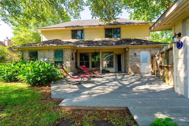 16526 Battlecreek Dr, Houston, TX 77095 - back of house featuring brick siding and a wooden deck