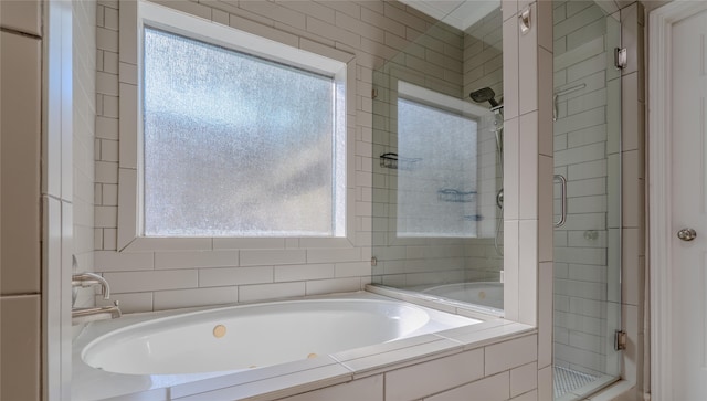 16526 Battlecreek Dr, Houston, TX 77095 - full bathroom with healthy amount of natural light, a shower stall, and a bath