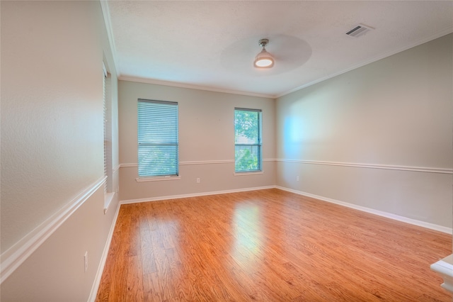 16526 Battlecreek Dr, Houston, TX 77095 - unfurnished room with wood finished floors, crown molding, ceiling fan, and baseboards