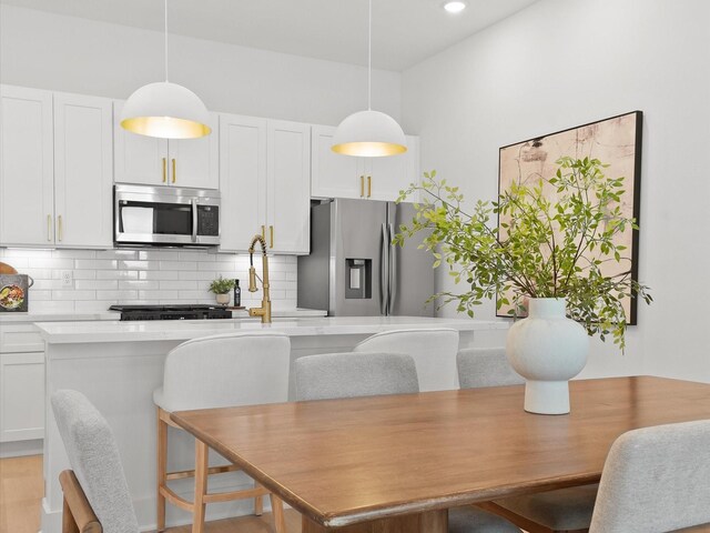 249 De Boll Ave, Houston, TX 77022 - dining room featuring recessed lighting and light wood finished floors
