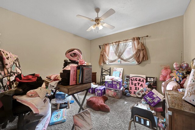 carpeted bedroom with a ceiling fan